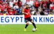 صورة لمحمد صلاح يرتدي قميص ليفربول مع شعار ترانسفير ماركت