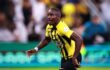 لاعب كرة قدم عربي يرتدي قميص الاتحاد السعودي